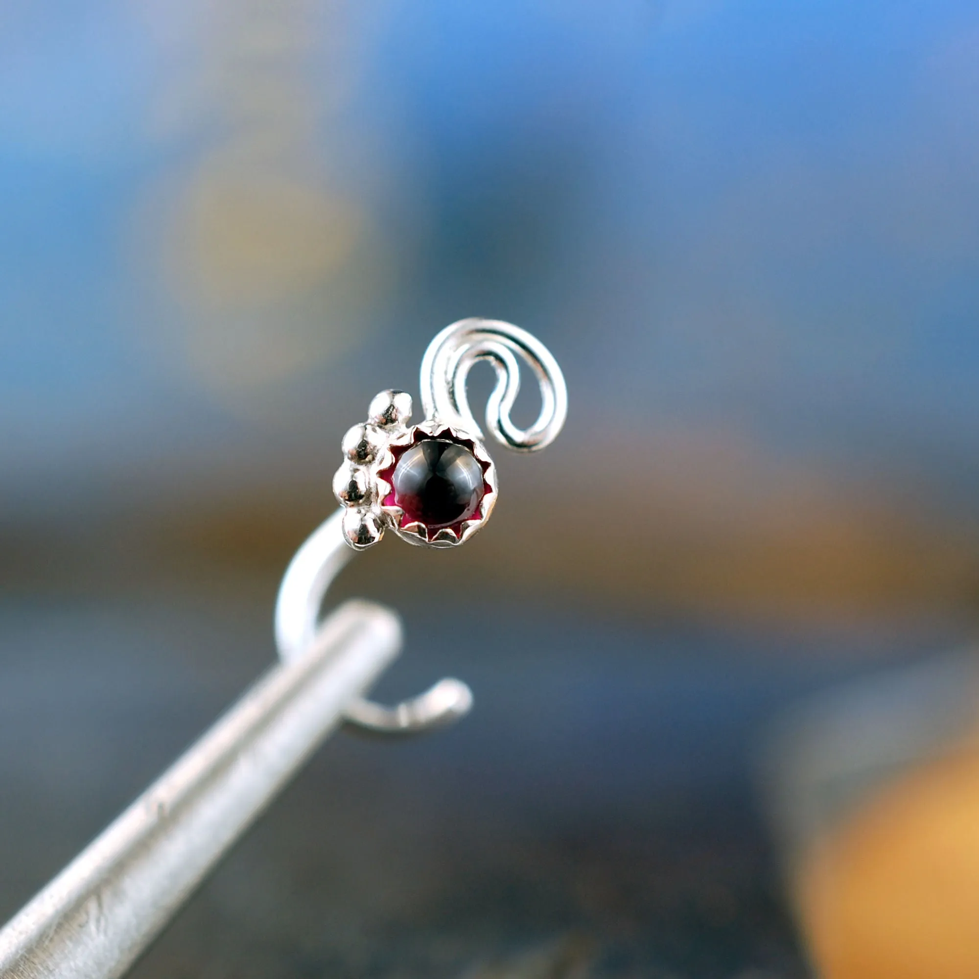 Garnet Twist Nose Stud