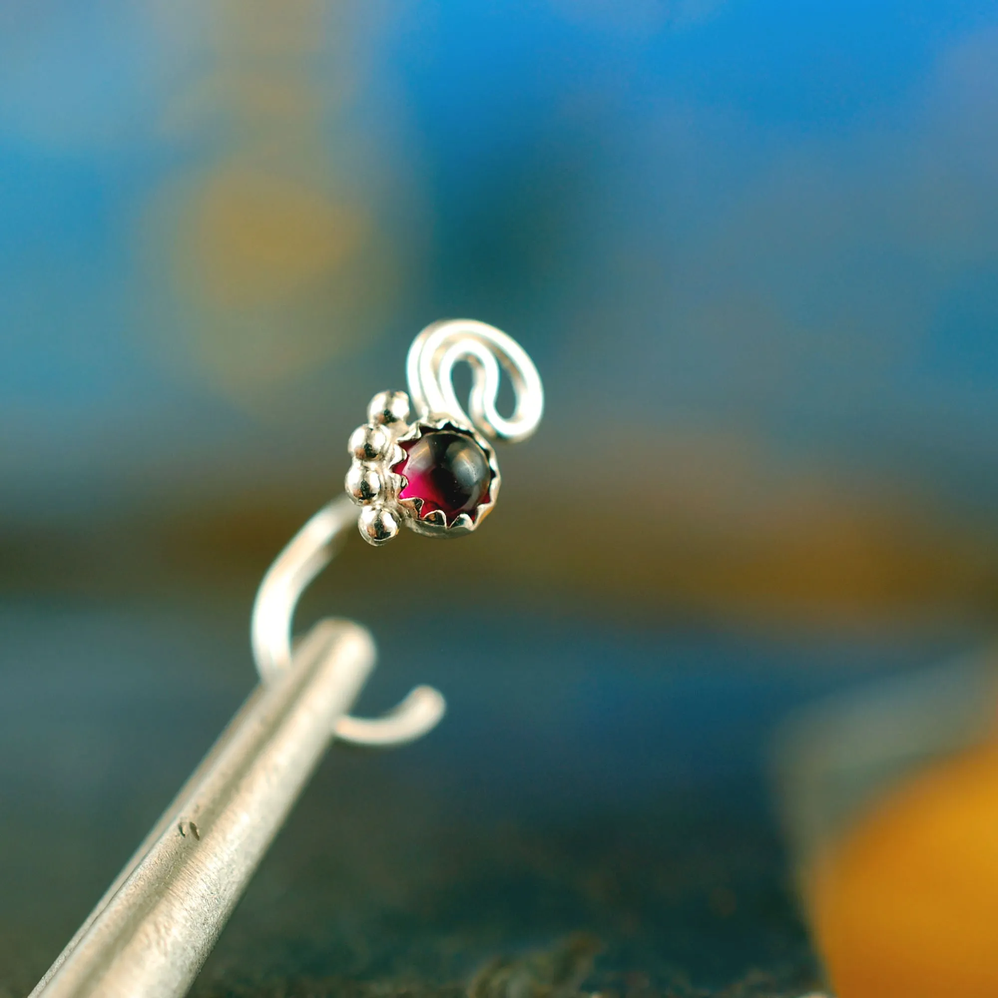 Garnet Twist Nose Stud